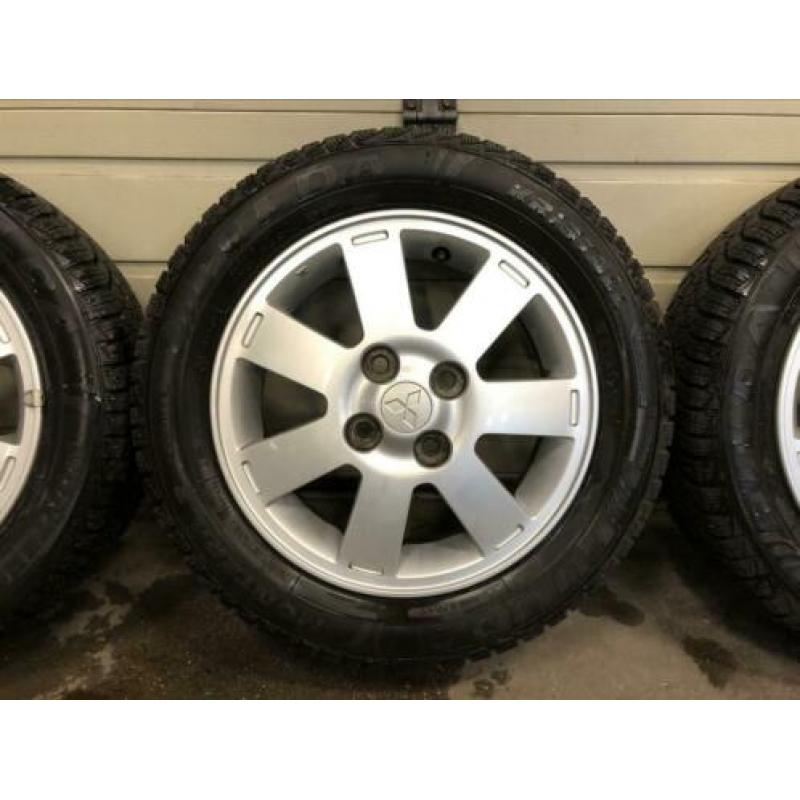 Te Koop! Mitsubishi Spacestar velgen met winterband.