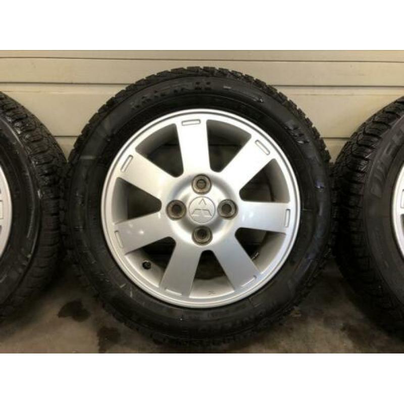 Te Koop! Mitsubishi Spacestar velgen met winterband.