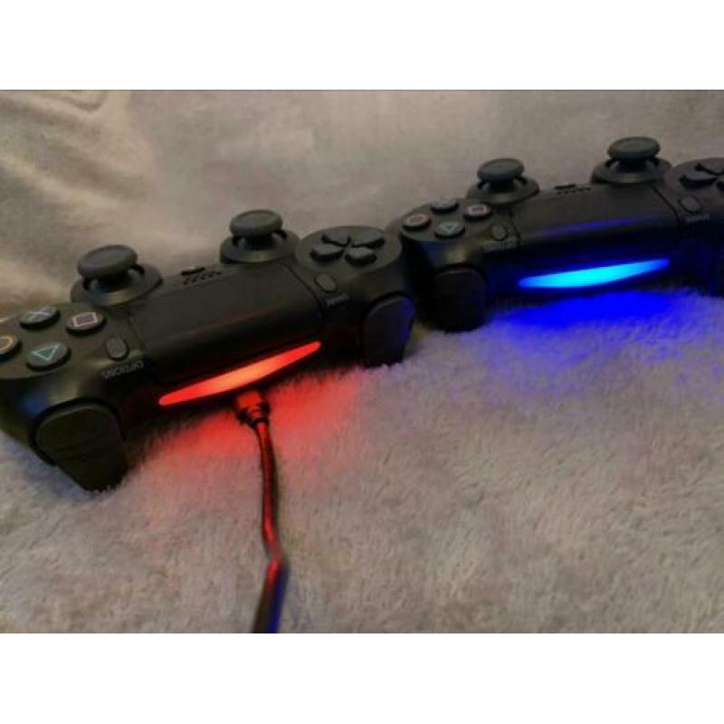 PlayStation 4 met 1TB + 2 controllers + koptelefoon +1 spel
