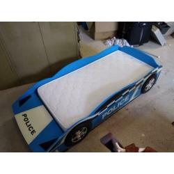 Politie auto bed jongens