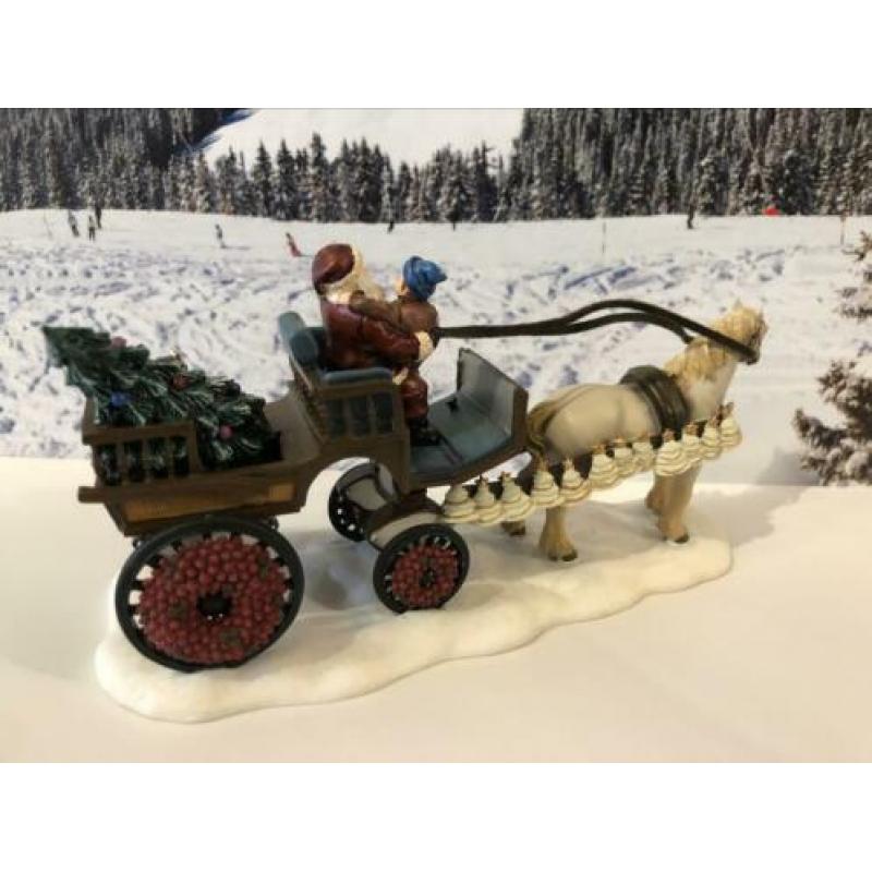 Santa And Child Van Luville voor in een Kerstdorp!!