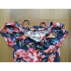 super leuke zomer jumpsuit WE 134 - 140 bloemen