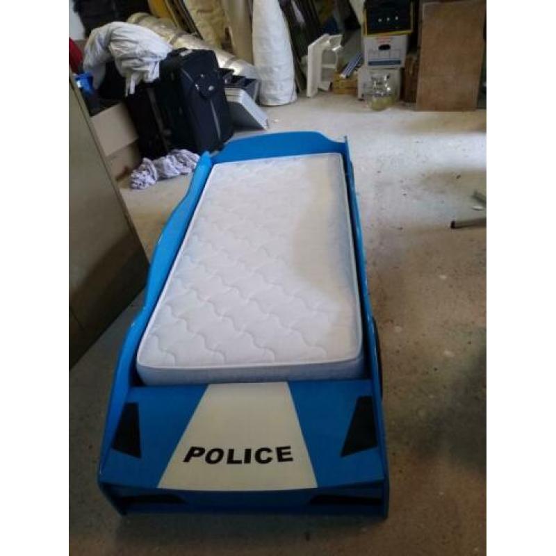 Politie auto bed jongens