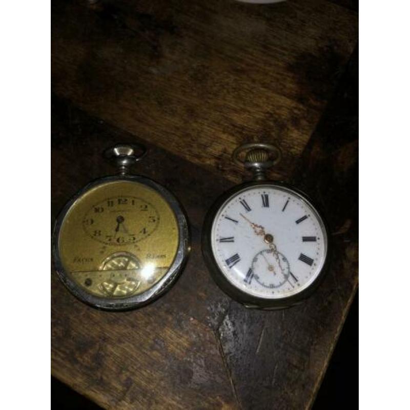 2 vestzakhorloges oa 1met chronometer lopen niet
