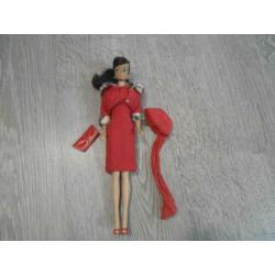 Vintage Barbie swirl brunette met kledij.