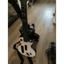 Gitar Hero Wii met 6 spellen en 2 gitaren en 2 microfoons