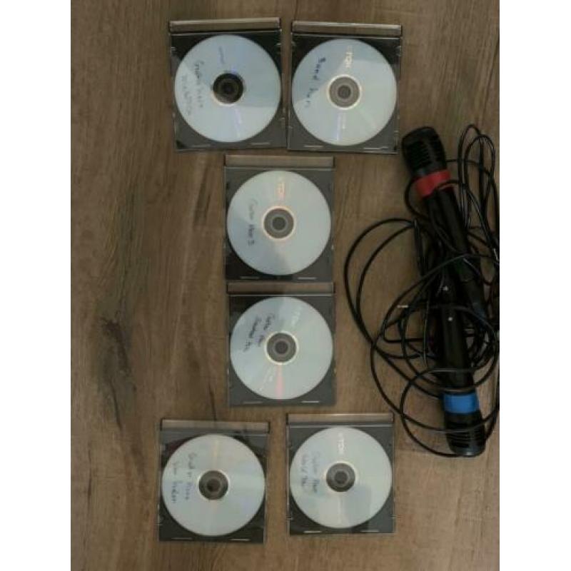 Gitar Hero Wii met 6 spellen en 2 gitaren en 2 microfoons