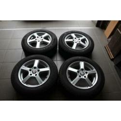 4 mooie 15 inch aluminium velgen met Dunlop winterbanden