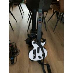 Gitar Hero Wii met 6 spellen en 2 gitaren en 2 microfoons