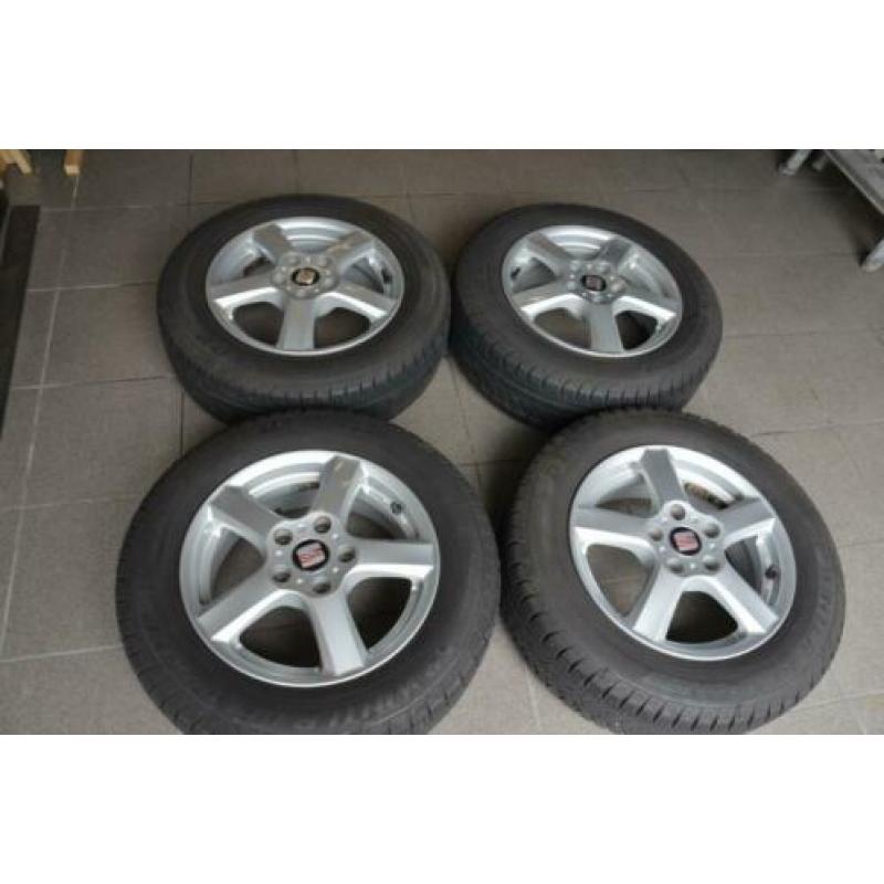 4 mooie 15 inch aluminium velgen met Dunlop winterbanden