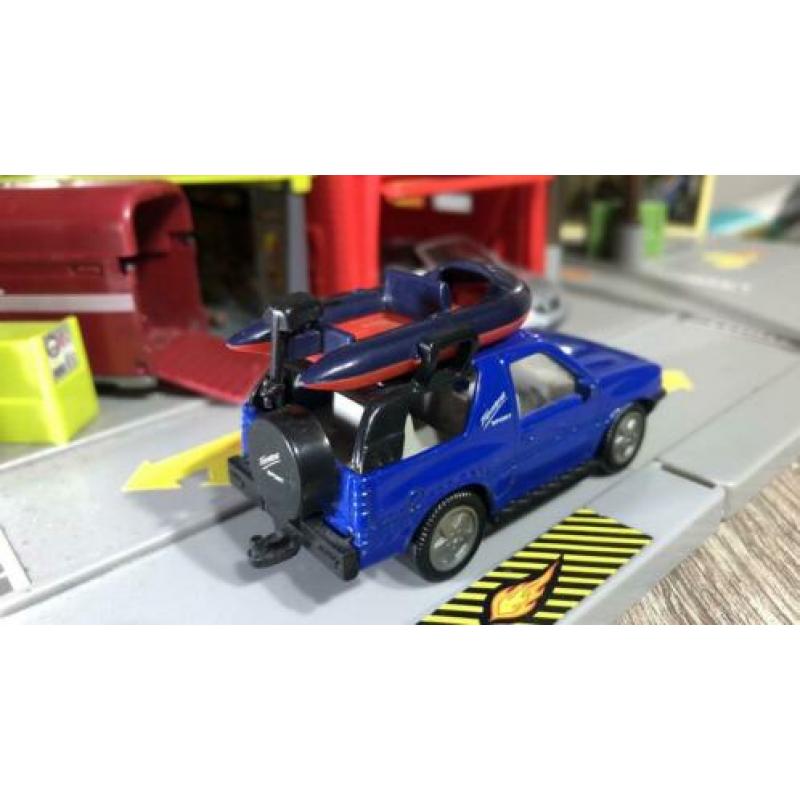 Opel Frontera sport 1/64 siku incl boot VAVB