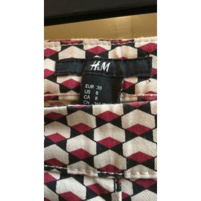 Leuke SKINNY, met mooi motiefje van HM mt 38 NIEUWSTAAT