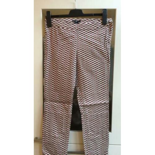 Leuke SKINNY, met mooi motiefje van HM mt 38 NIEUWSTAAT