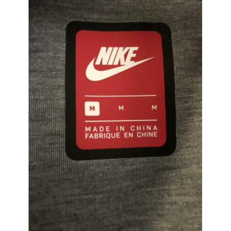 Regenjas Nike M dames