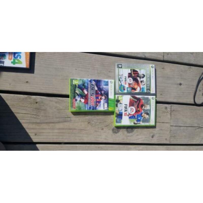 Xbox 360 met 7 spellen.
