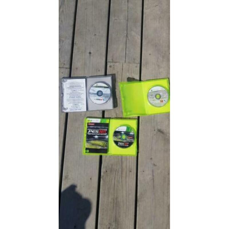 Xbox 360 met 7 spellen.