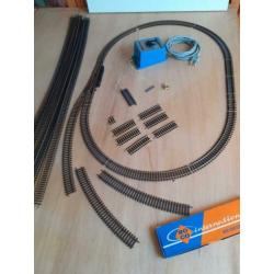 Roco line rails zónder bedding en Titan trafo gelijkstroom