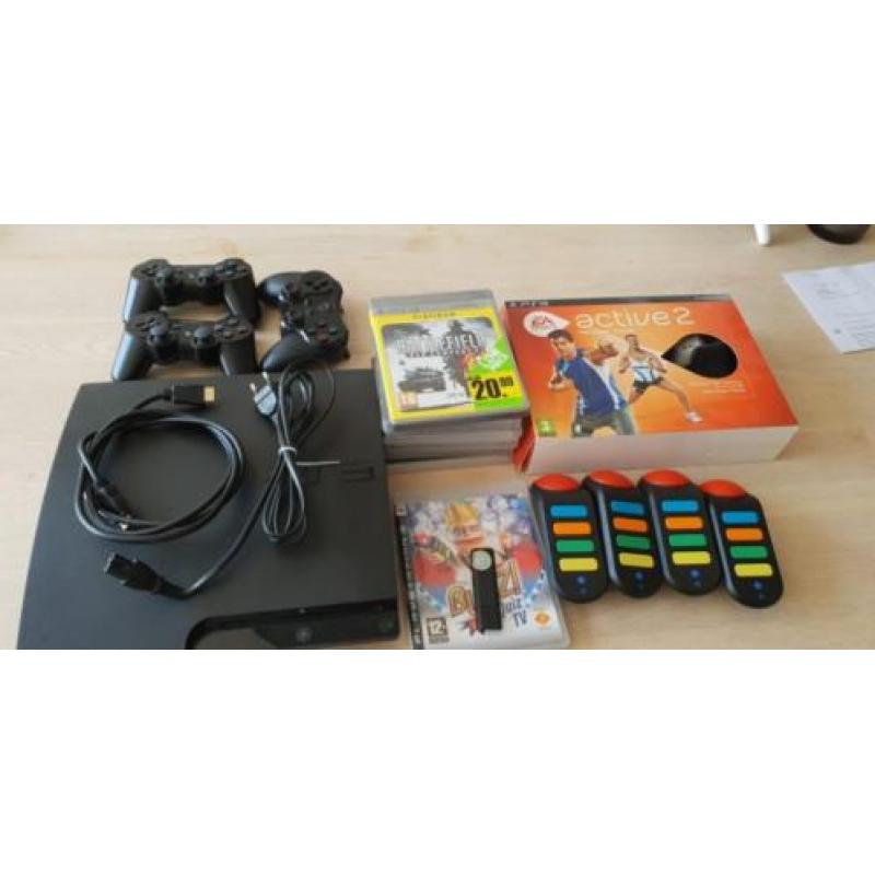 Ps3, 3 controllers, 9 games, incl buzz tv and active 2