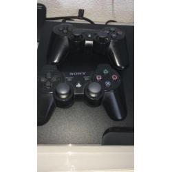 Playstation 3 met 2 controllers en 9 games