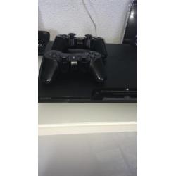 Playstation 3 met 2 controllers en 9 games