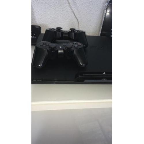Playstation 3 met 2 controllers en 9 games