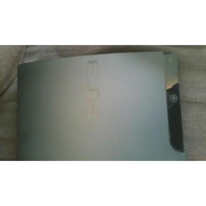 Playstation 3 met 9 spellen en 2 controllers